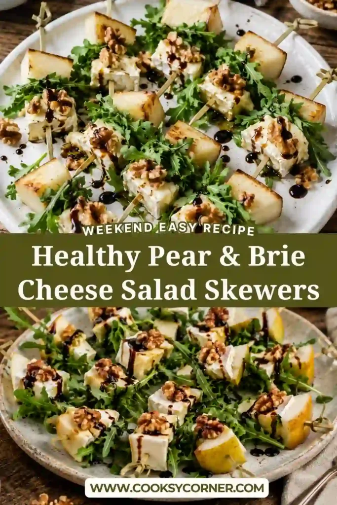 Close-up of pear and brie skewers arranged on a serving tray. The combination of sweet pears, rich brie, crunchy walnuts, and fresh greens creates a beautiful party appetizer.