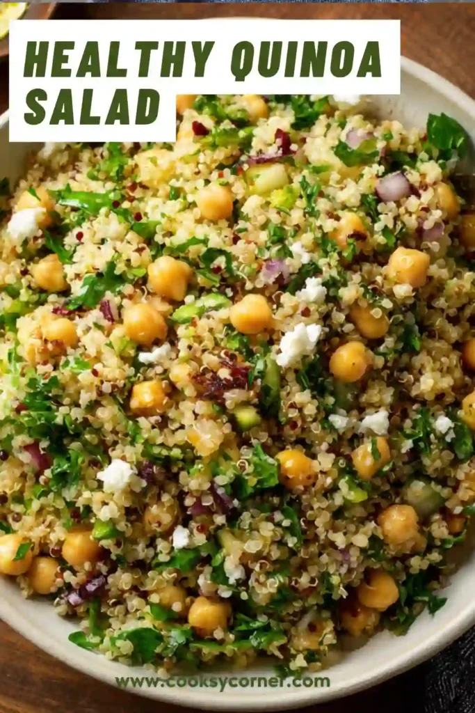 Healthy quinoa chickpea salad featuring pistachios, parsley, mint, and feta cheese. This colorful Aniston Salad Recipe is packed with texture and fresh flavor.