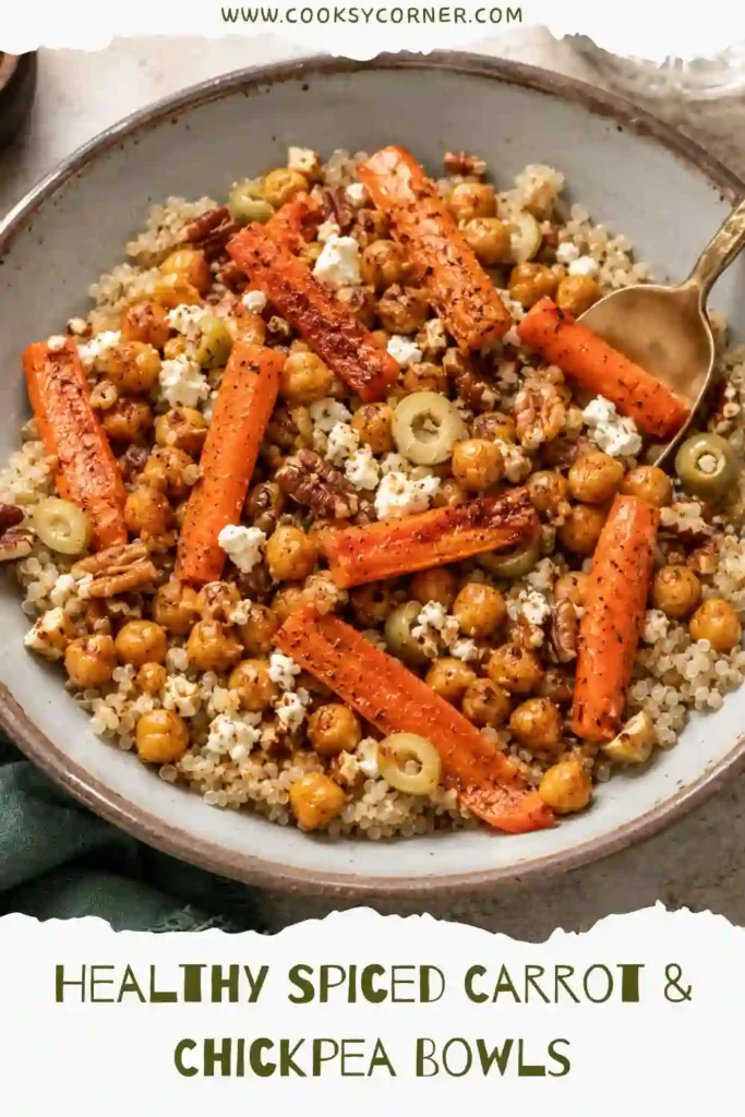 Roasted carrot and chickpea bowl served with quinoa and feta in a rustic ceramic bowl. This meal prep-friendly recipe is rich in texture and flavor.