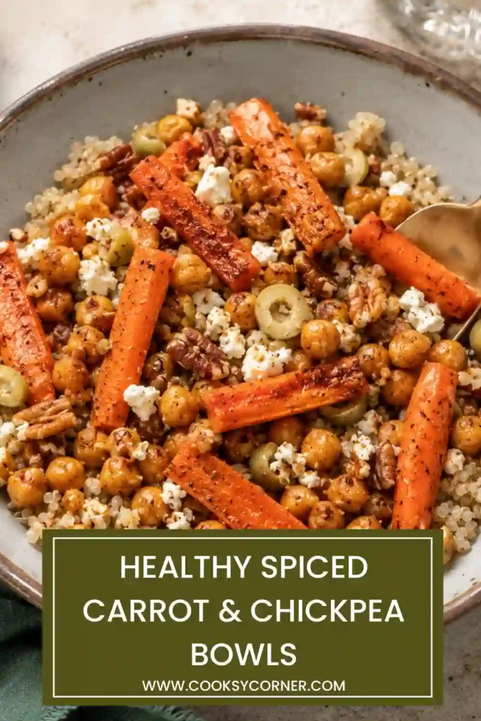Healthy spiced carrot chickpea bowl featuring roasted vegetables, quinoa, feta cheese, walnuts, and olives. A balanced vegetarian meal perfect for lunch or dinner.