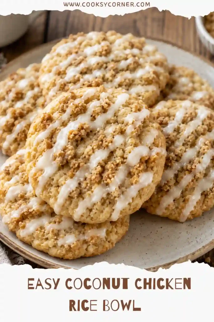 Stacked Heavenly Coffee Cake Cookies showcasing crunchy crumb topping and glossy cinnamon glaze. Freshly baked cookies displayed on a serving platter.