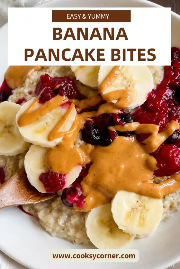 Warm vegan oatmeal topped with peanut butter, berries, pumpkin seeds, and banana slices.