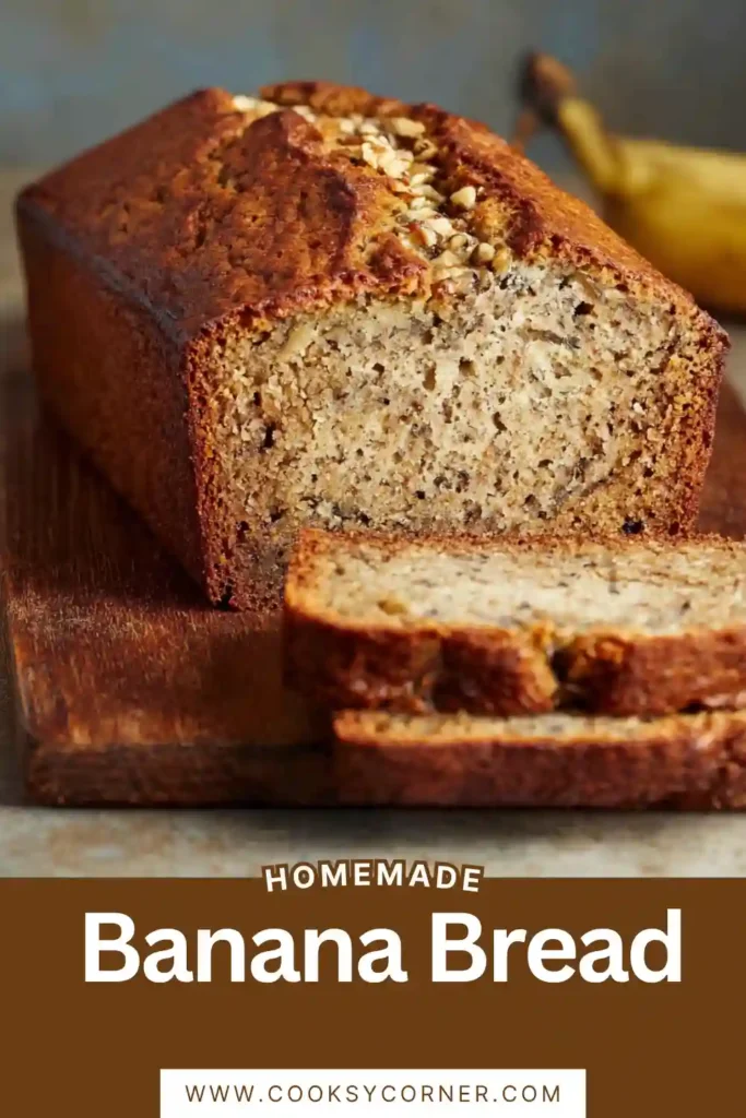 A loaf of homemade banana bread with walnuts and warm spices. The soft texture and rich banana flavor make it a perfect breakfast treat.