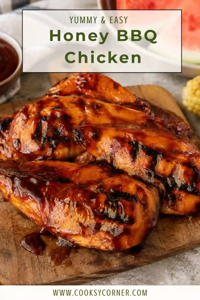 Tender grilled chicken coated in sticky honey barbecue sauce and served on a rustic platter.