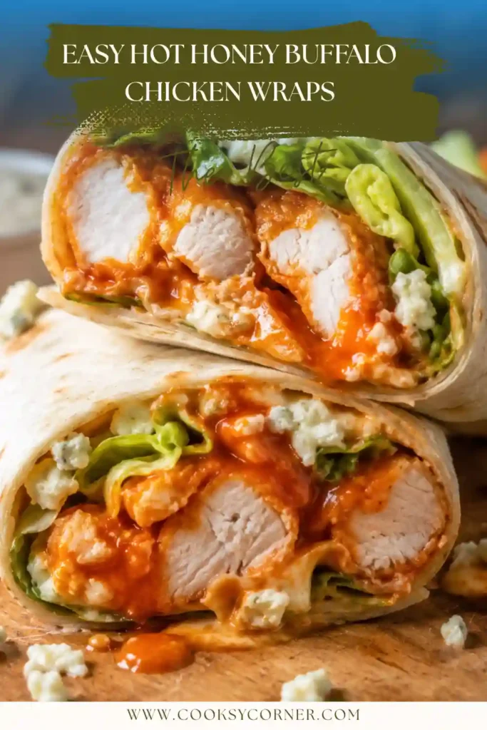 A plate of hot honey buffalo chicken wraps served with celery sticks, carrot sticks, and extra dipping sauce.
