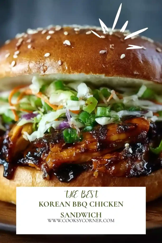 A Korean BBQ Chicken Sandwich served on a toasted brioche bun with juicy gochujang chicken and crunchy red and green cabbage slaw. The sandwich is packed with bold Korean-inspired flavors.