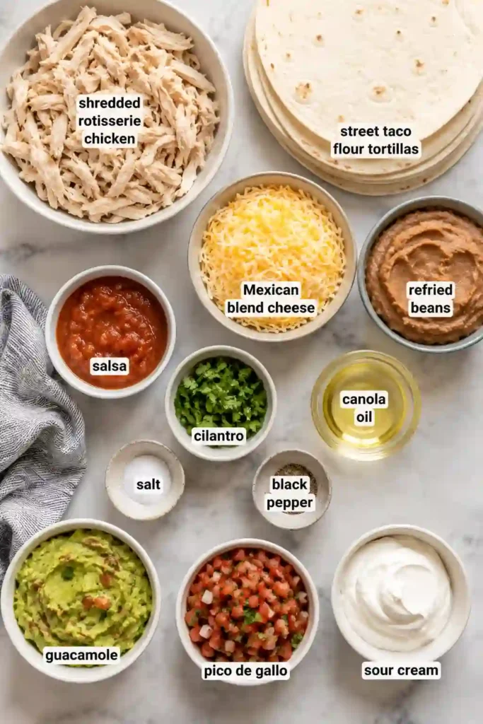 Homemade Mini Chicken Quesadillas arranged on a serving tray with guacamole and pico de gallo. Crispy tortillas and flavorful chicken filling create a delicious snack or meal.