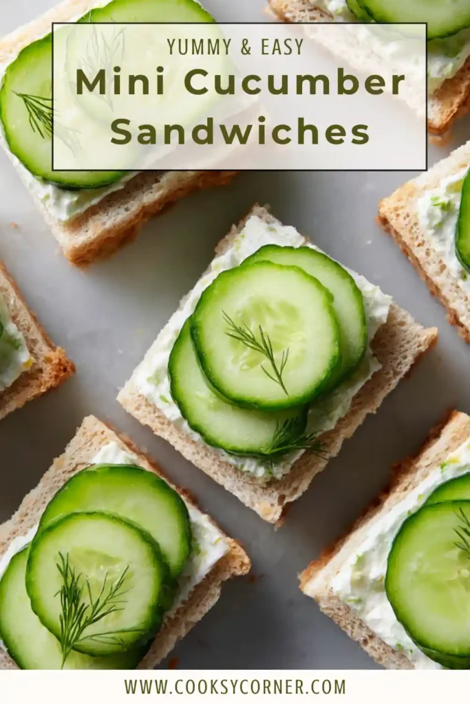A platter filled with Mini Cucumber Sandwiches garnished with dill and arranged for a party.