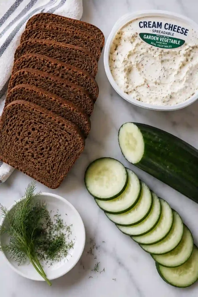 Homemade Mini Cucumber Sandwiches served as finger food for tea parties, bridal showers, and brunch events.