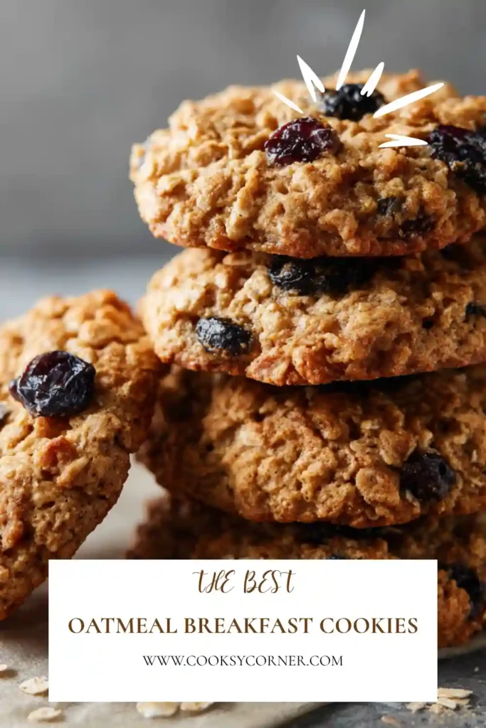 Healthy vegan oatmeal breakfast cookies arranged on a baking tray. Packed with rolled oats, walnuts, and naturally sweet maple flavor.