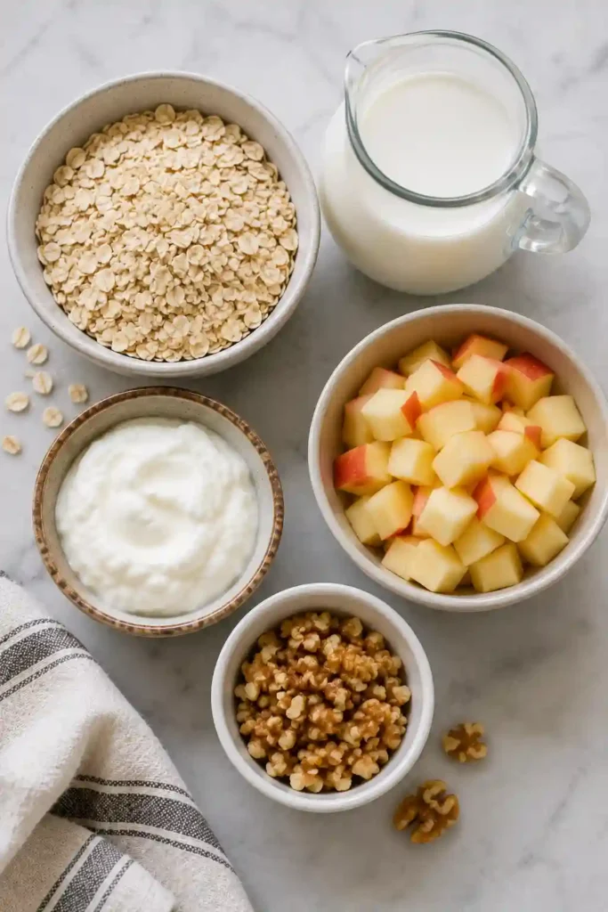 Protein-packed oatmeal breakfast topped with apples, walnuts, and yogurt. A simple and wholesome breakfast idea.