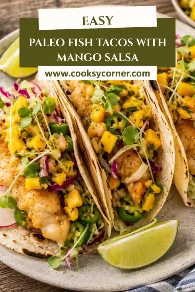 Fresh paleo fish tacos with crispy cod, tropical mango salsa, cilantro, and grain-free tortillas.