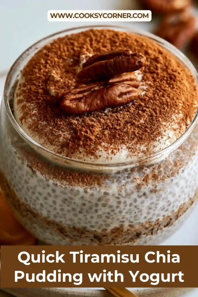 A glass jar filled with Quick Tiramisu Chia Pudding with Yogurt topped with creamy Greek yogurt and cocoa powder. The healthy breakfast features coffee-infused chia pudding with a rich tiramisu-inspired flavor.