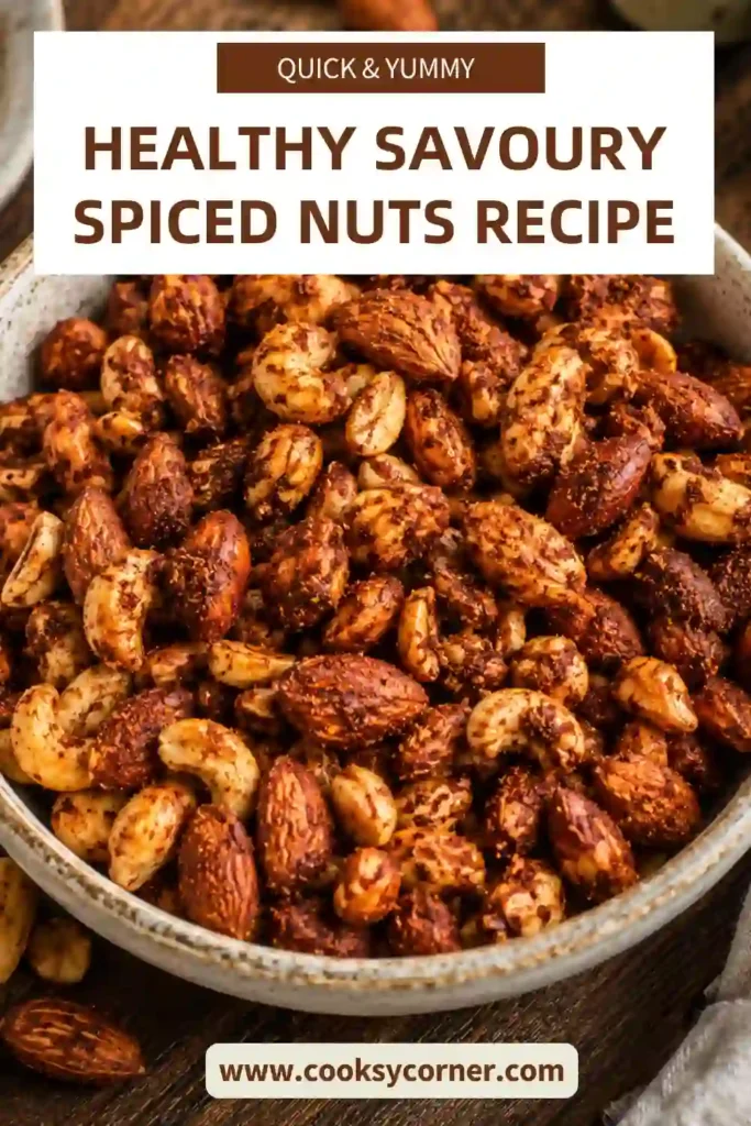 Savoury Spiced Nuts featuring roasted almonds, cashews, and peanuts coated in smoky paprika seasoning. A crunchy homemade snack served in a rustic bowl.