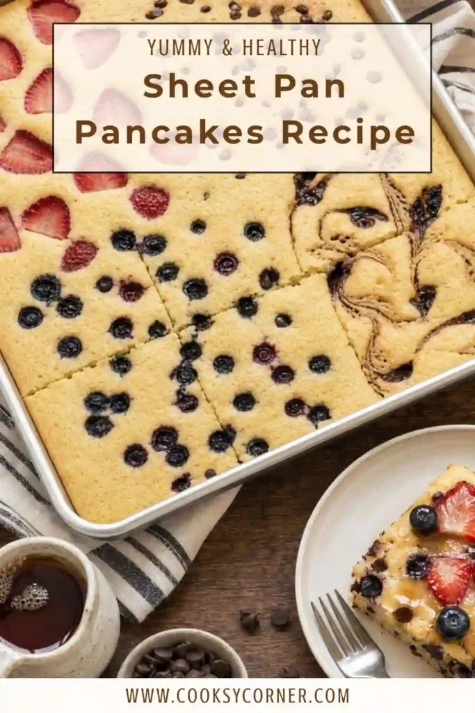 Colorful Sheet Pan Pancakes baked in a rectangular pan with mixed berry and chocolate toppings. Each slice offers a fluffy texture and rich homemade flavor.