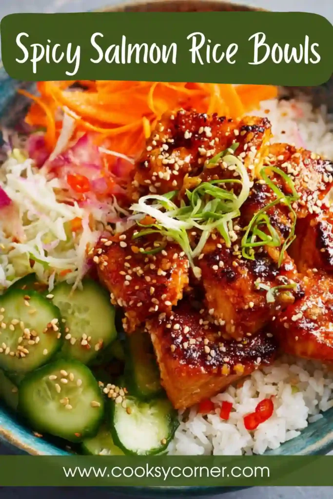 Spicy Salmon Rice Bowls topped with cucumber, kimchi, and sesame seeds.