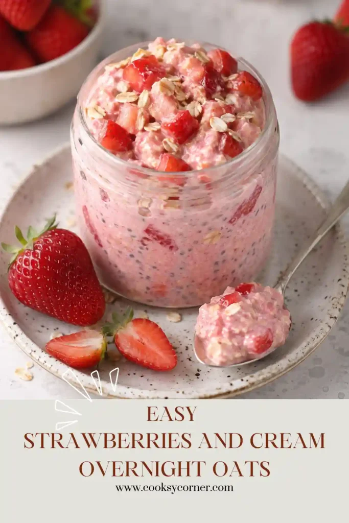 A close-up of creamy strawberry overnight oats garnished with fresh berries. The thick texture and vibrant fruit make this breakfast both attractive and satisfying.