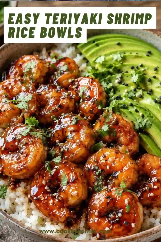 A bowl of teriyaki shrimp served over fluffy jasmine rice with sliced avocado and fresh cilantro. The shrimp are coated in a glossy teriyaki sauce and finished with fresh lime.