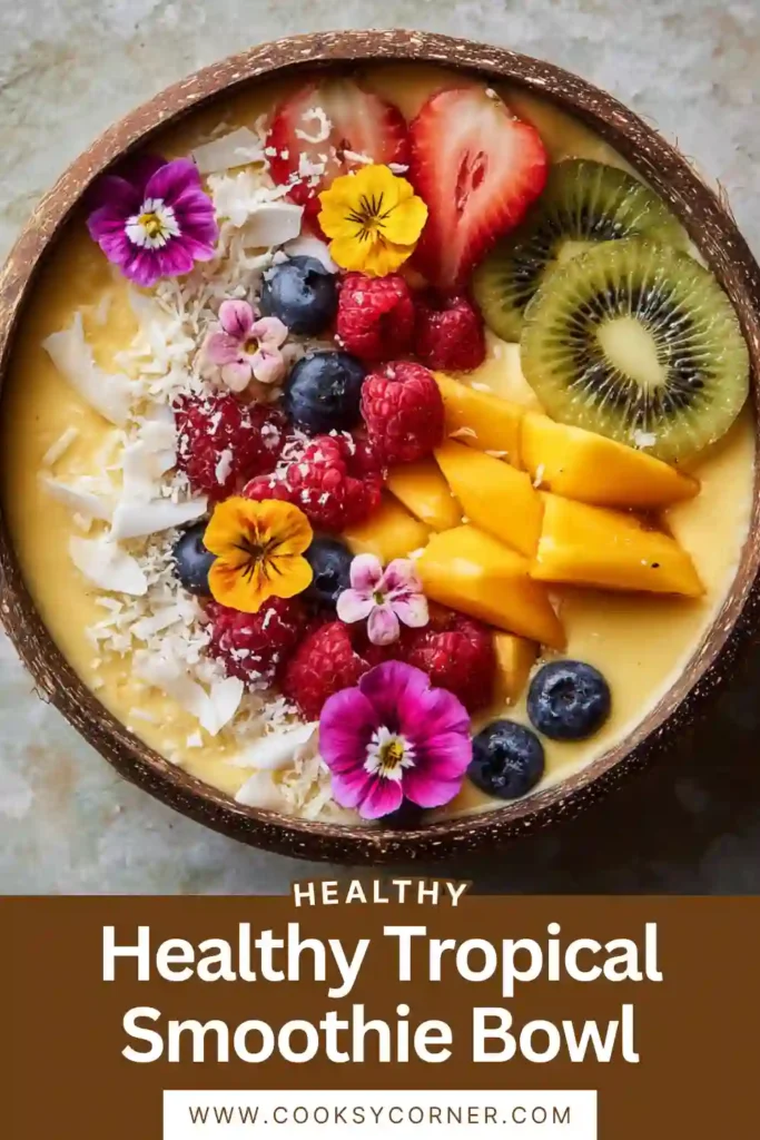 Healthy smoothie bowl featuring frozen fruit blended into a thick base and garnished with tropical toppings.
