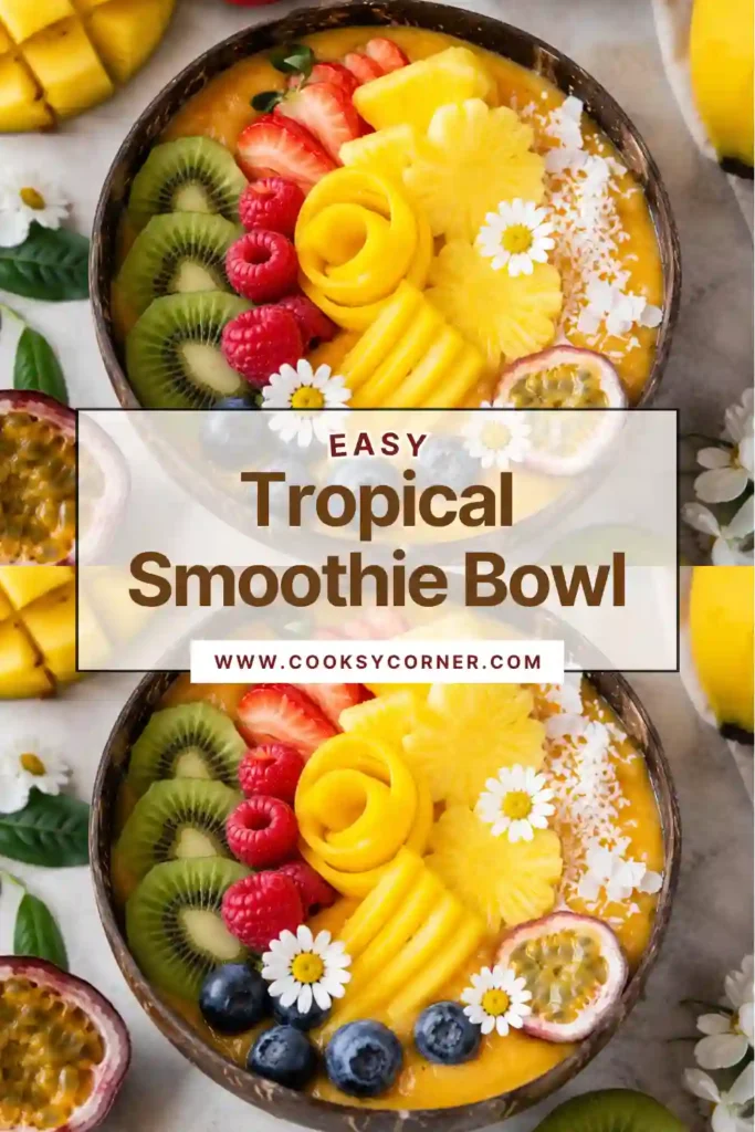 Creamy Tropical Smoothie Bowl blended with frozen fruit and topped with pineapple, blueberries, and crunchy granola. A healthy breakfast packed with tropical flavors.