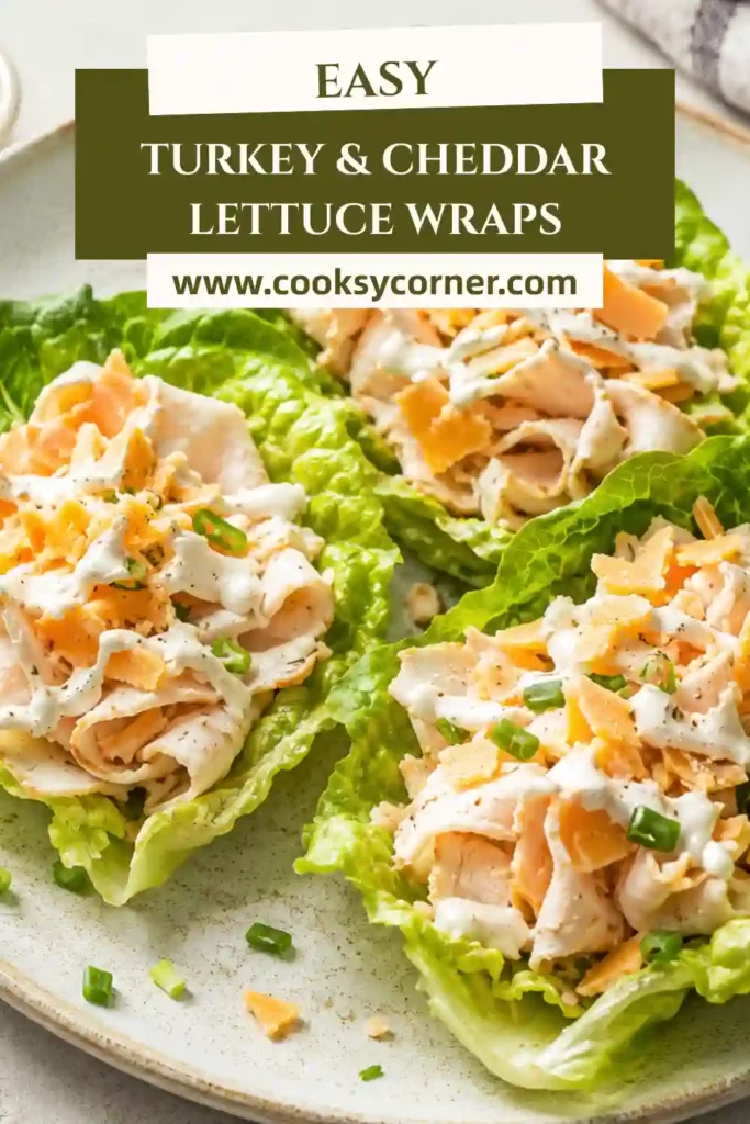 Healthy turkey lettuce wraps arranged on a serving platter with fresh tomatoes and cheese. These gluten-free wraps are quick to prepare and perfect for busy weekdays.