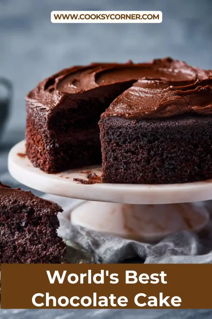Rich dark chocolate cake covered in silky ganache and paired with mascarpone cream. The dessert features a moist crumb and elegant presentation.