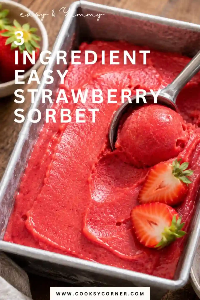 Creamy homemade strawberry sorbet scooped into a serving bowl and garnished with fresh strawberries and mint leaves. A simple frozen dessert without an ice cream maker.