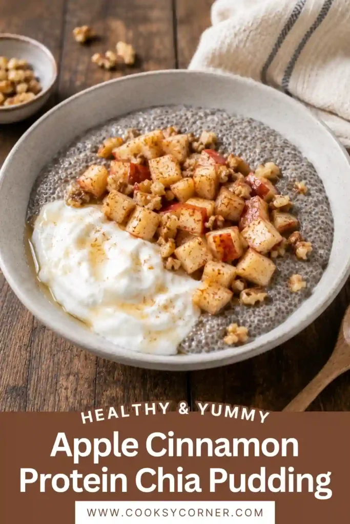 A bowl of Apple Cinnamon Protein Chia Pudding topped with creamy Greek yogurt, fresh cinnamon apples, and crunchy walnuts. This healthy breakfast bowl is rich in protein and perfect for meal prep.
