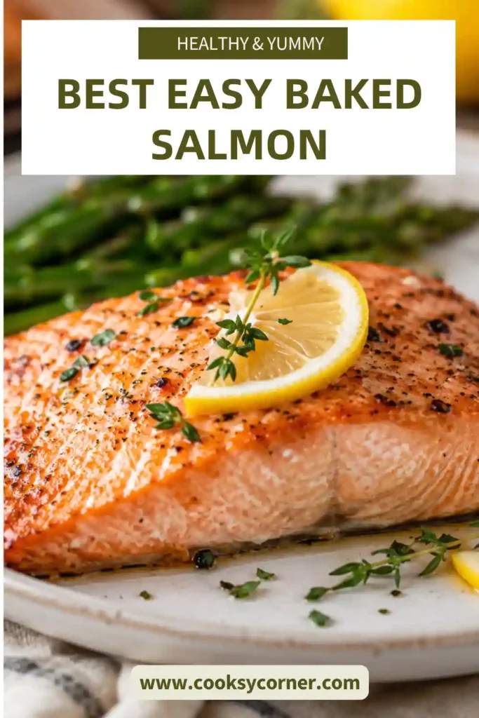 Flaky baked salmon fillets seasoned with garlic, Italian herbs, and lemon, garnished with chopped parsley.