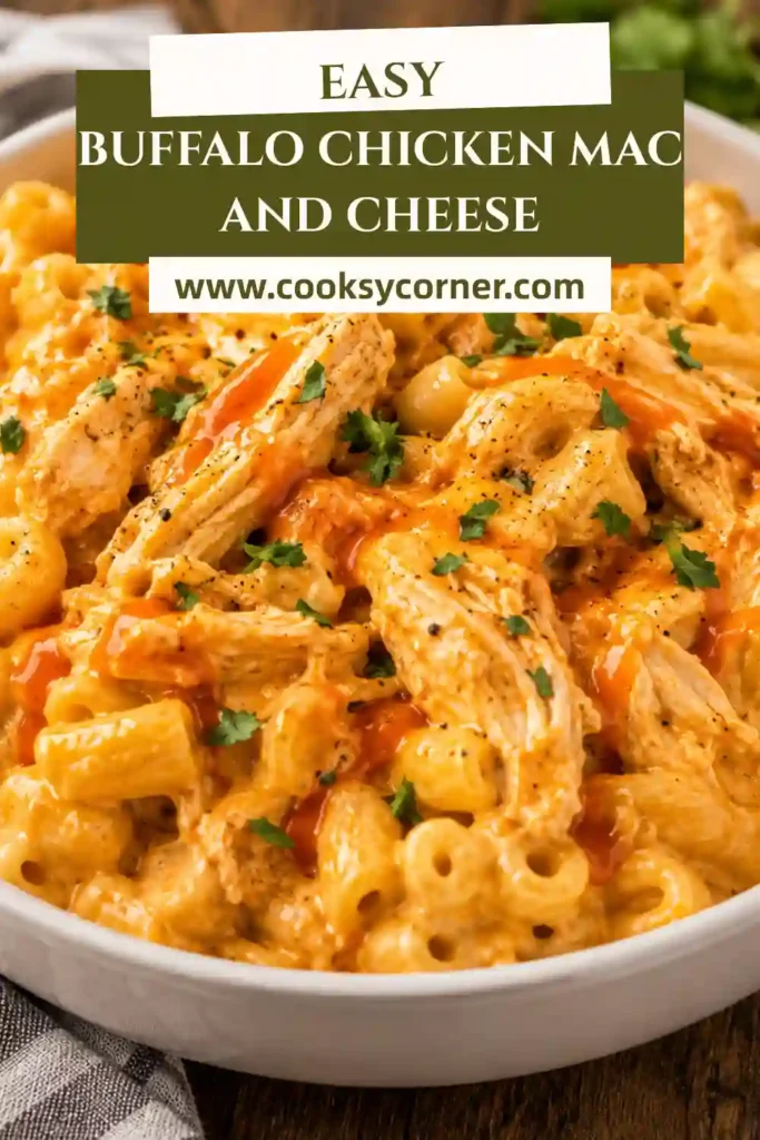 A bowl of creamy Buffalo Chicken Mac and Cheese made with shredded chicken, elbow macaroni, melted Cheddar, Monterey Jack, and buffalo sauce, garnished with chopped parsley.