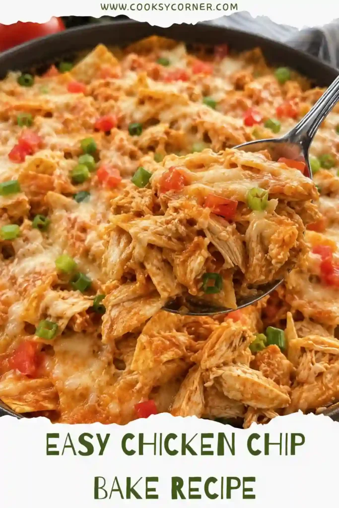 A close-up of Chicken Chip Bake showing layers of crispy tortilla chips, shredded chicken, pinto beans, melted cheese, and enchilada sauce in every bite.