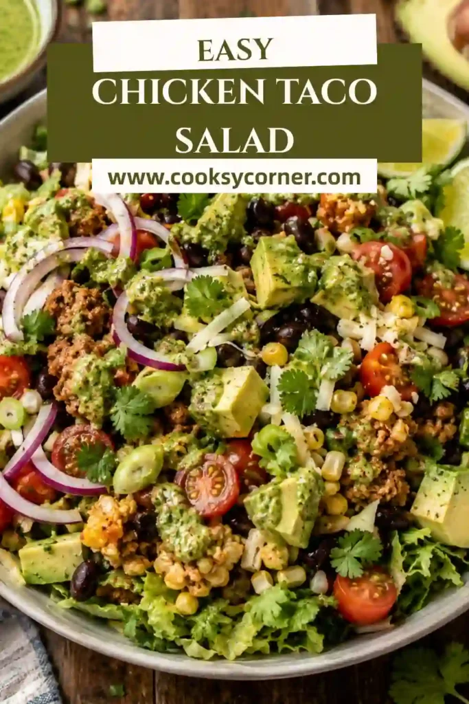Overhead view of healthy Chicken Taco Salad ingredients prepared for cooking, including fresh vegetables, ground chicken, herbs, cheese, corn, and homemade dressing.