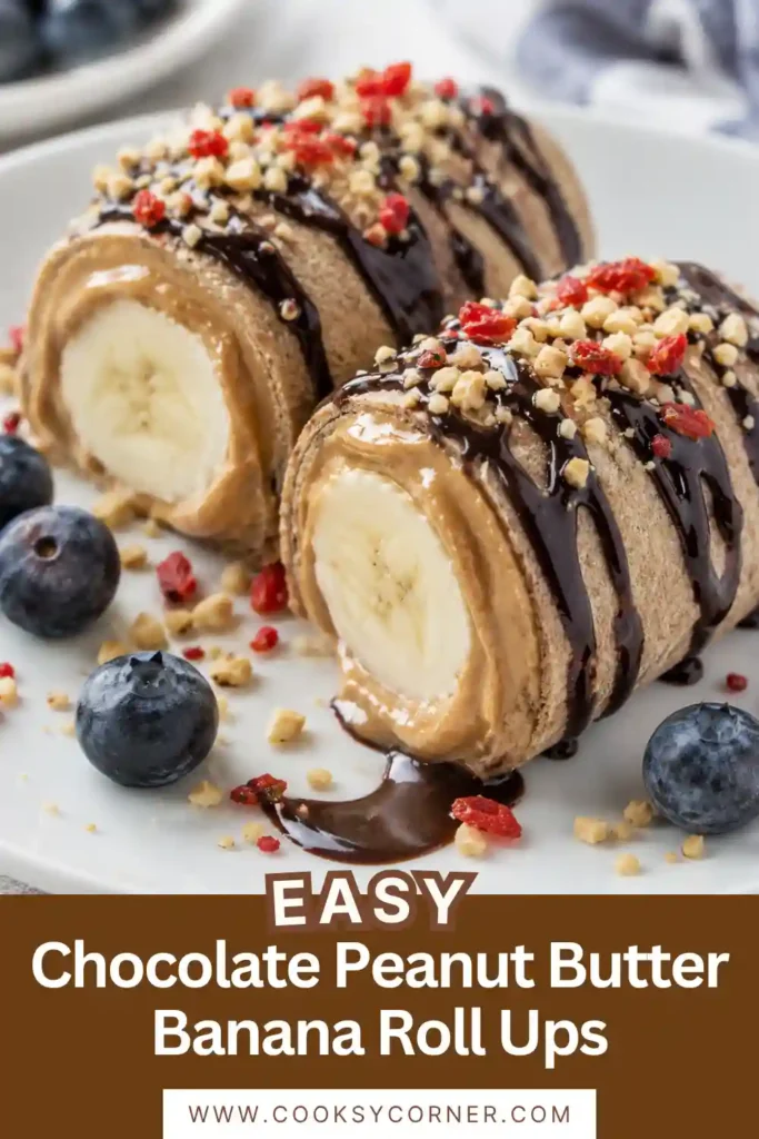 Whole grain crepes wrapped around ripe bananas with peanut butter filling and topped with rich chocolate sauce, chopped nuts, and goji berries. A delicious homemade breakfast recipe.