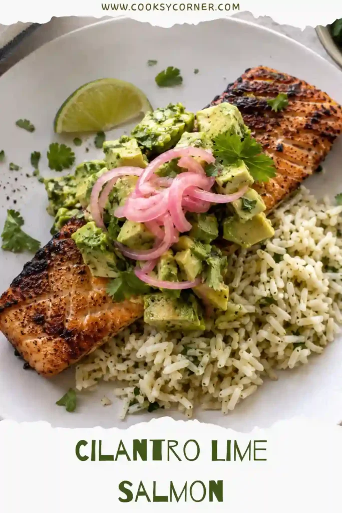 Fresh Cilantro Lime Salmon garnished with lime slices and vibrant green herb sauce.