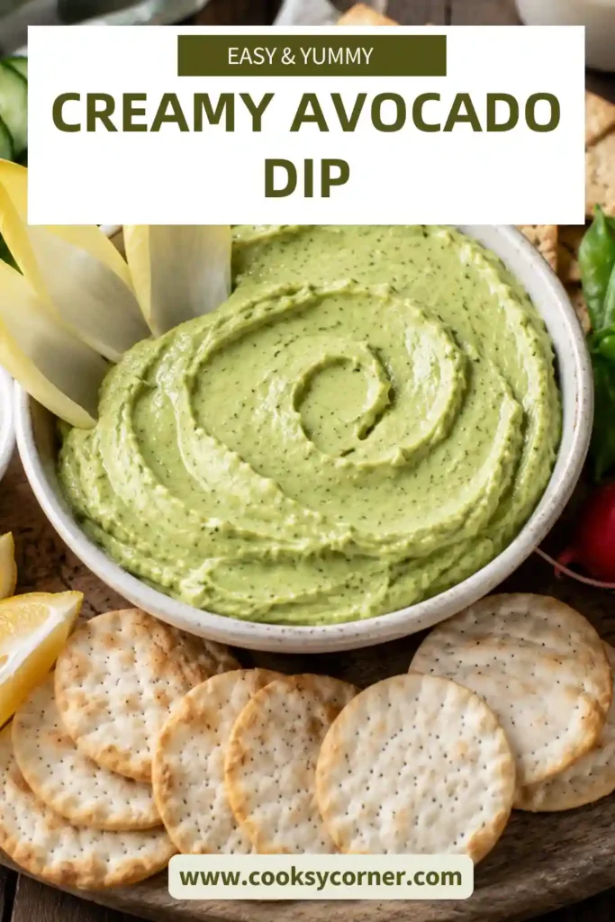 Healthy avocado dip blended with Greek yogurt, garlic, lemon, and herbs served as a fresh appetizer.