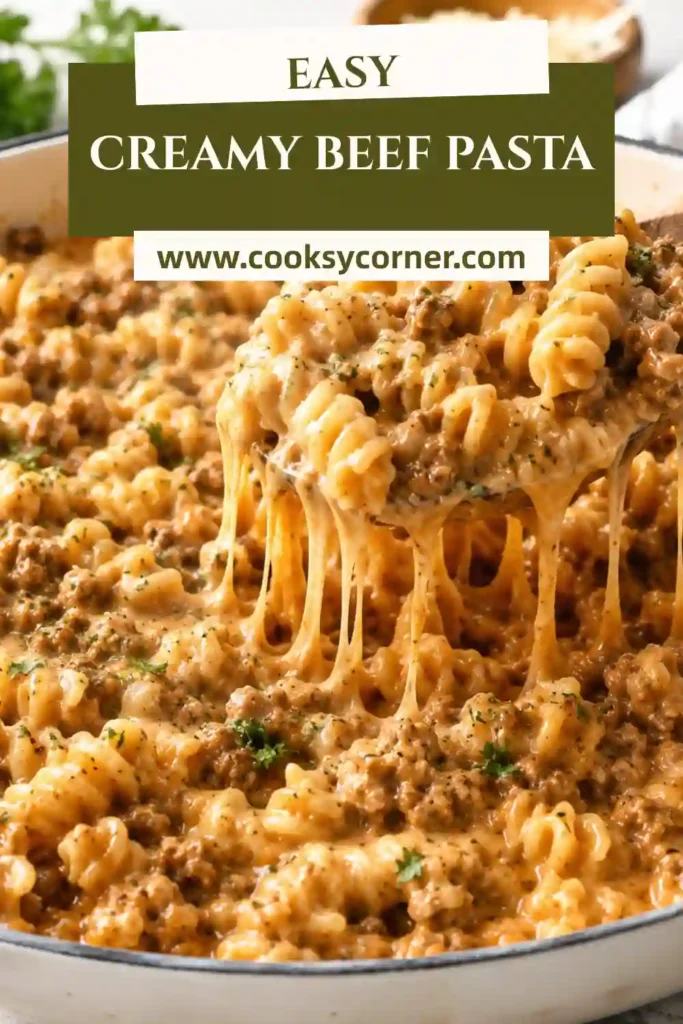 A bowl of creamy beef pasta made with rotini, seasoned ground beef, tomato cream sauce, and melted cheddar cheese. Garnished with fresh parsley for a comforting family dinner.