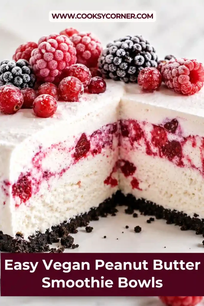 Easy Berry Ice Cream Cake sliced to reveal layers of brownie, vanilla ice cream, strawberry ice cream, and fresh berries. The frozen dessert is colorful, creamy, and perfect for summer celebrations.