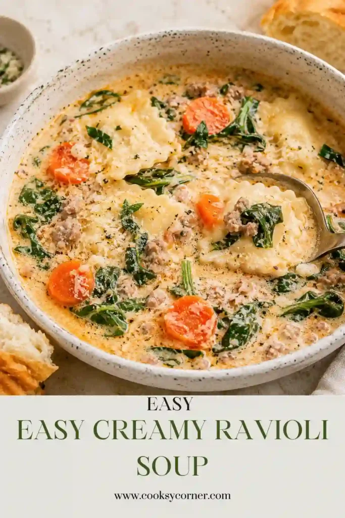 Creamy Ravioli Soup served hot with tender ravioli, wilted spinach, and Parmesan cheese in a velvety tomato base. A hearty one-pot soup perfect for family dinners.