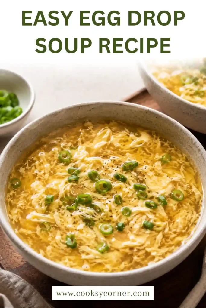 A steaming bowl of Easy Egg Drop Soup with silky egg ribbons floating in a rich chicken broth and topped with freshly chopped green onions. This quick homemade Chinese-inspired soup is warm, comforting, and perfect for any season.
