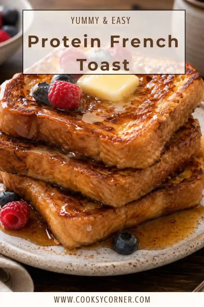 Homemade Easy Protein French Toast stacked on a plate with fresh fruit and a drizzle of maple syrup for a nutritious breakfast.