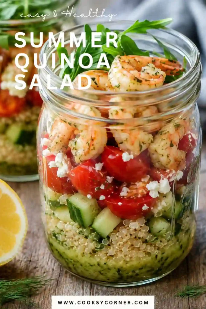 A colorful Summer Quinoa Salad served in a mason jar with cucumbers, grape tomatoes, feta cheese, quinoa, and homemade lemon dill dressing. This healthy Mediterranean-inspired meal prep salad is fresh and vibrant.