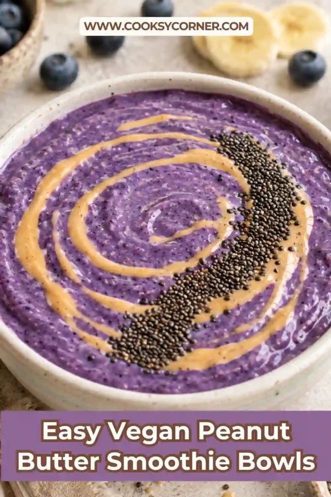 Thick Vegan Peanut Butter Smoothie Bowls topped with fresh berries, chia seeds, and peanut butter drizzle. A colorful, high-protein plant-based breakfast.