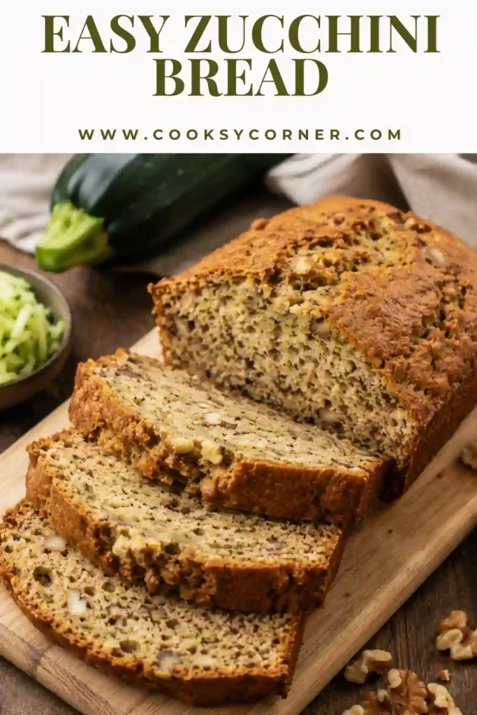 Homemade zucchini bread with a crisp golden top and soft interior served on a rustic platter. Fresh zucchini keeps every slice moist and flavorful.
