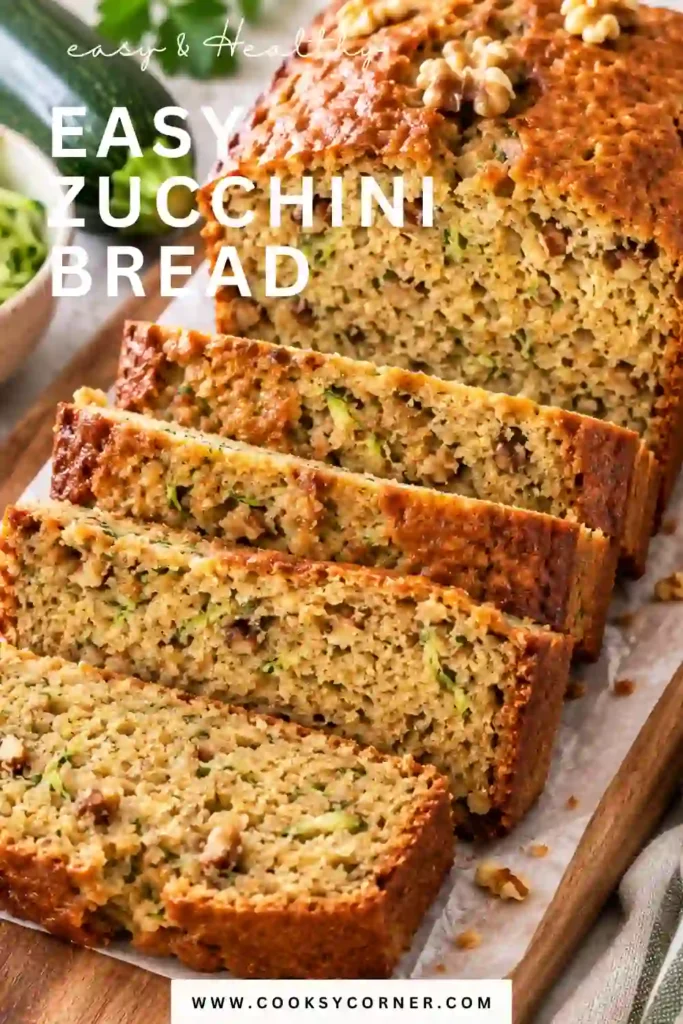 A freshly baked zucchini bread loaf with a golden brown crust and moist, tender slices. This easy homemade zucchini bread is made with fresh zucchini, cinnamon, and optional walnuts.