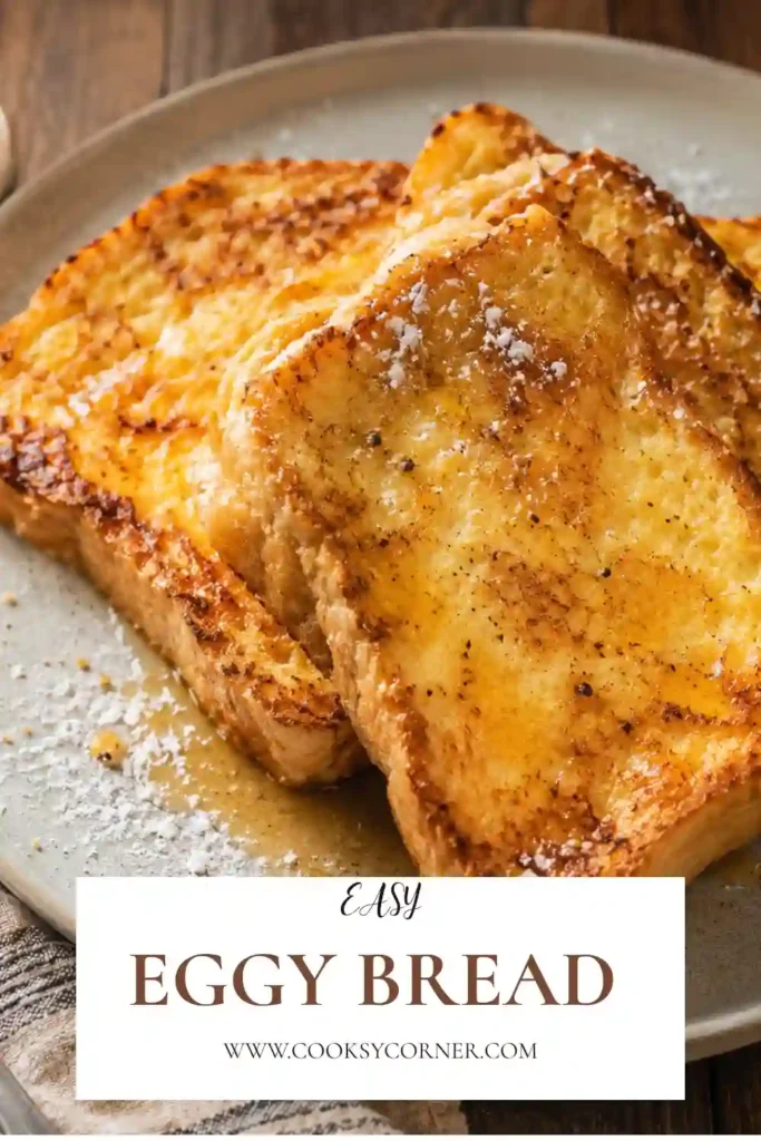 Homemade Eggy Bread with a crisp golden crust and soft center arranged on a white plate. This easy breakfast recipe is simple, comforting, and delicious.