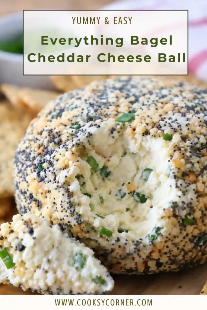 A creamy Everything Bagel Cheddar Cheese Ball coated in savory everything bagel seasoning and served with assorted crackers. This easy party appetizer is rich, flavorful, and perfect for entertaining.