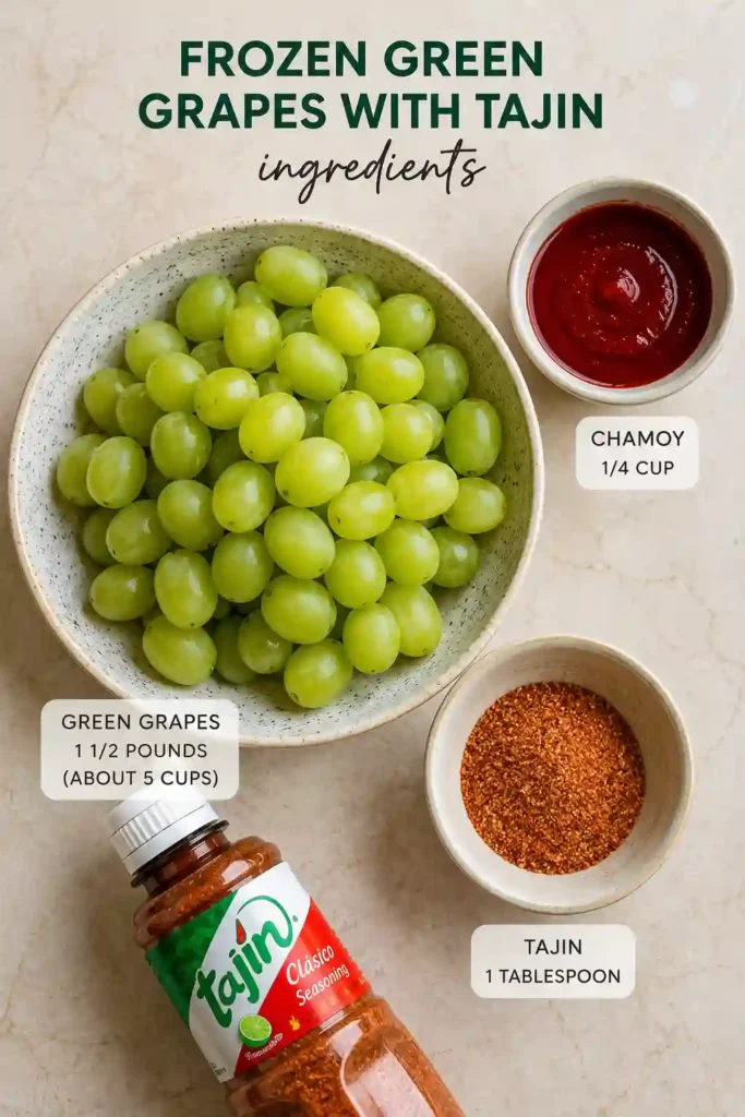 Homemade Frozen Green Grapes with Tajin served chilled on a platter. A quick frozen grapes recipe with chamoy and Tajin for a flavorful summer treat.