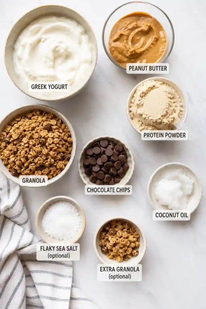 4. Chocolate-covered Frozen Yogurt Peanut Butter Cups with crunchy granola and creamy peanut butter filling. An easy frozen treat packed with flavor and protein.