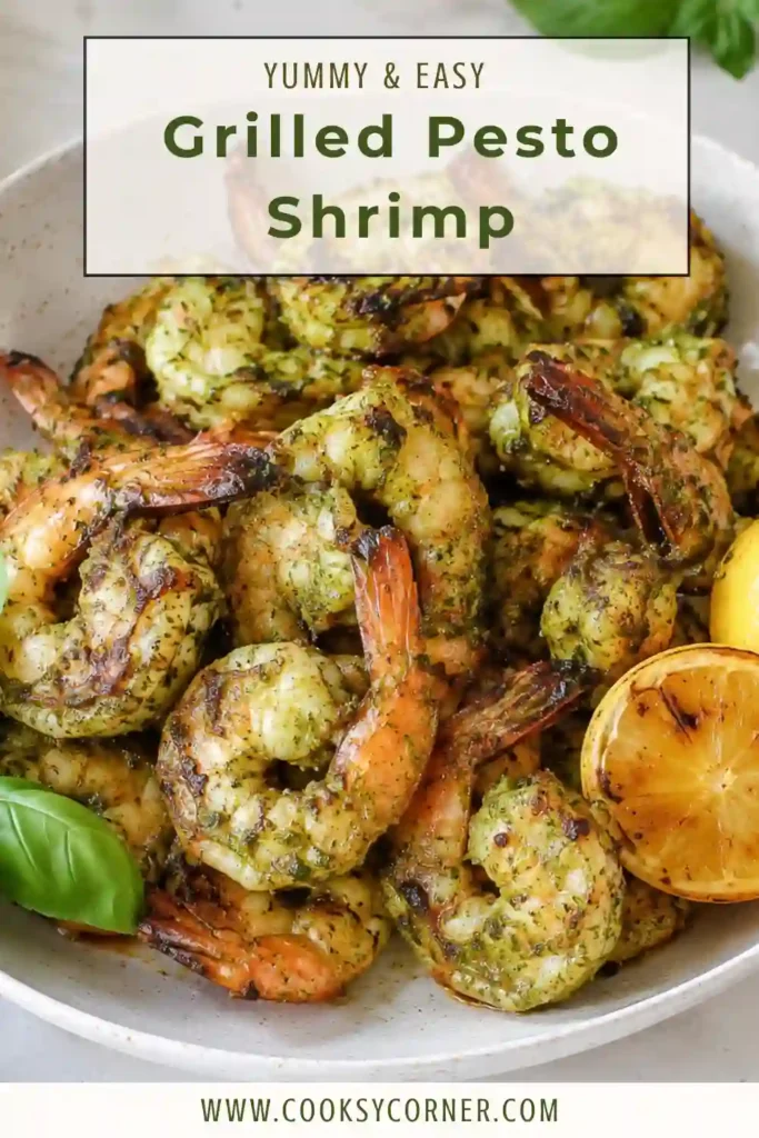Perfectly grilled shrimp tossed in homemade basil pesto and garnished with fresh basil leaves. This easy grilled shrimp recipe is ideal for healthy dinners.
