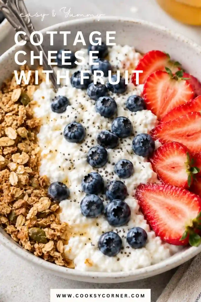 Creamy whipped cottage cheese is served in a bowl and topped with fresh mixed berries and a drizzle of honey. This high-protein Cottage Cheese with Fruit recipe is fresh, colorful, and perfect for breakfast.